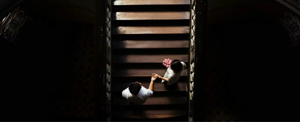 A bird eye perspective of a couple walking some steps in Saigon. A great image to help explain Saigon web design.